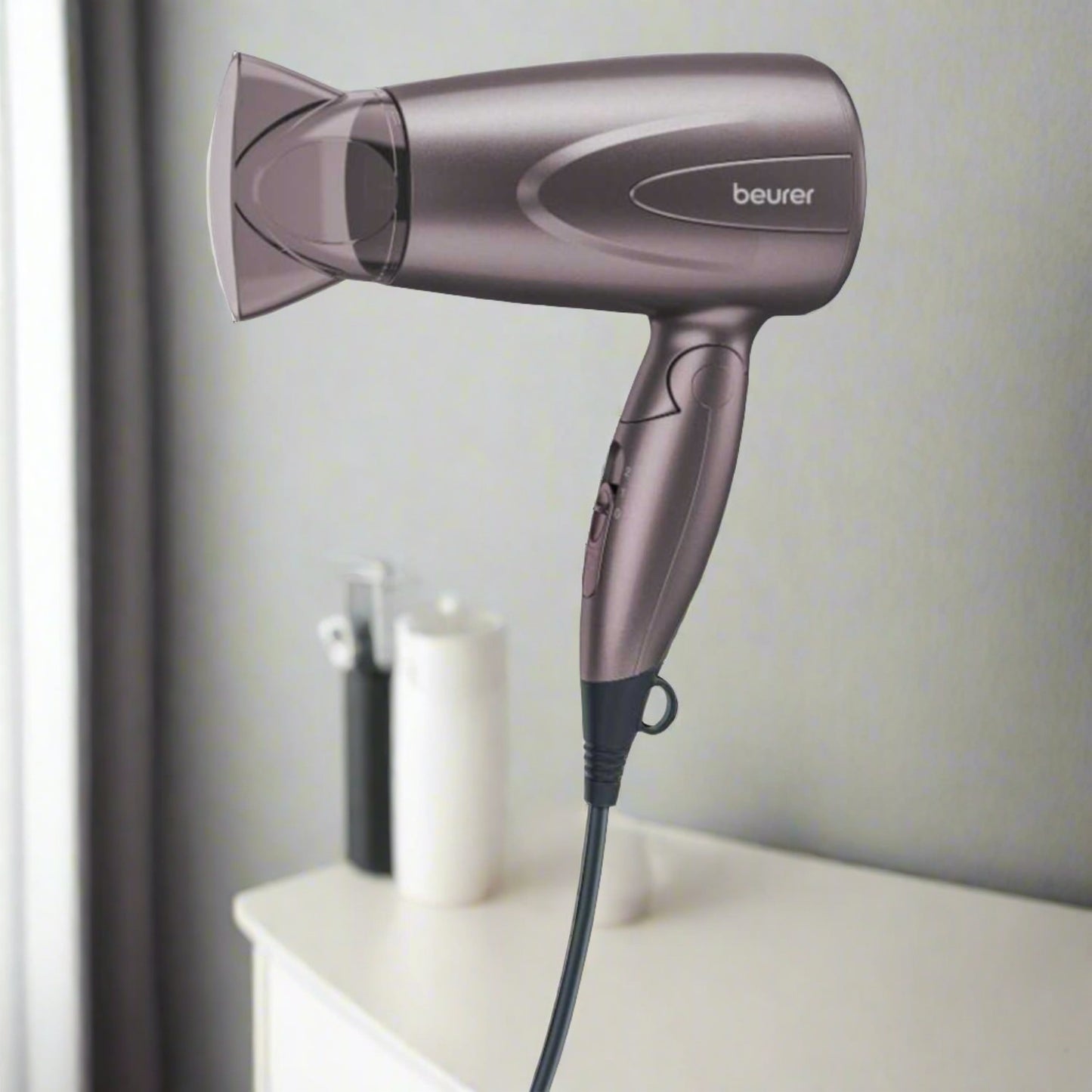TRAVEL HAIR DRYER WITH FOLDING HANDLE