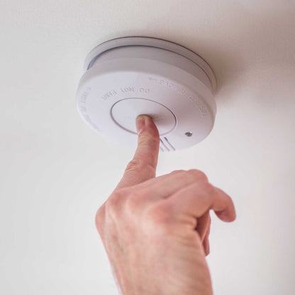 PHOTOELECTRIC SMOKE ALARM WITH HUSH FEATURE